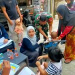 Babinsa Kedungkandang Dampingi Imunisasi Keliling, Pastikan Anak-Anak Tumbuh Sehat