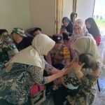 Babinsa Arjowinangun Posyandu Sosialisasi Vaksin Campak