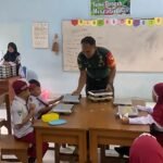 Babinsa Ketawanggede Dampingi Penyaluran Makan Bergizi Gratis Bagi Anak Sekolah Dasar