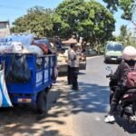 Pohon Tumbang di Jalan Raya Bokor Pagedangan Turen, Polsek Turen Sigap Evakuasi dan Atur Lalin